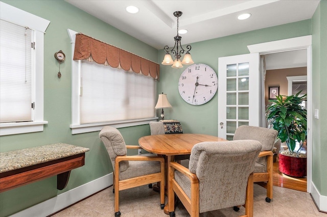 dining room featuring light tile patterned floors, recessed lighting, baseboards, a wealth of natural light, and an inviting chandelier