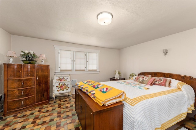 bedroom featuring a textured ceiling