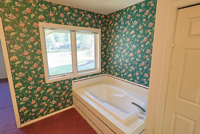 bathroom featuring baseboards, a garden tub, and wallpapered walls
