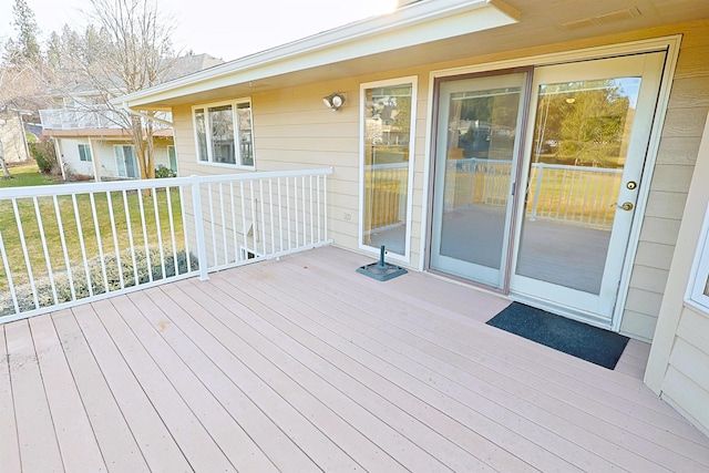 deck with a lawn
