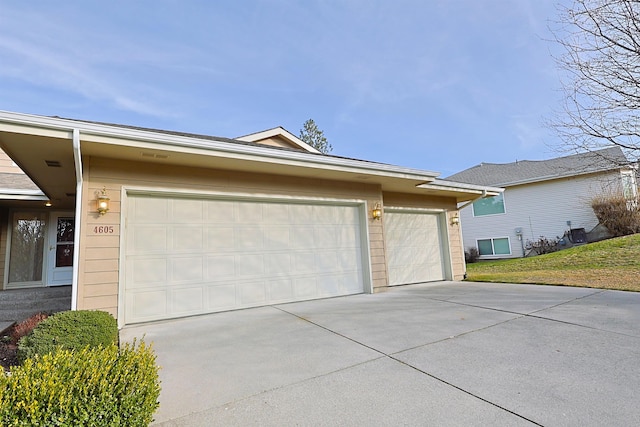 exterior space with concrete driveway