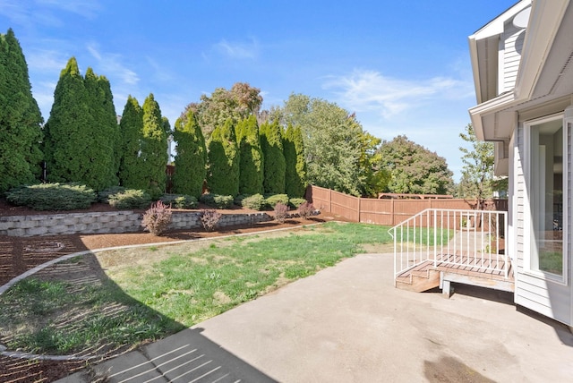 view of patio / terrace featuring fence