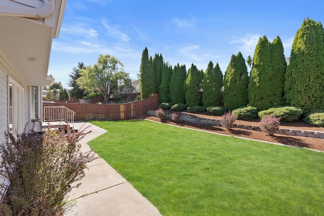 view of yard featuring fence