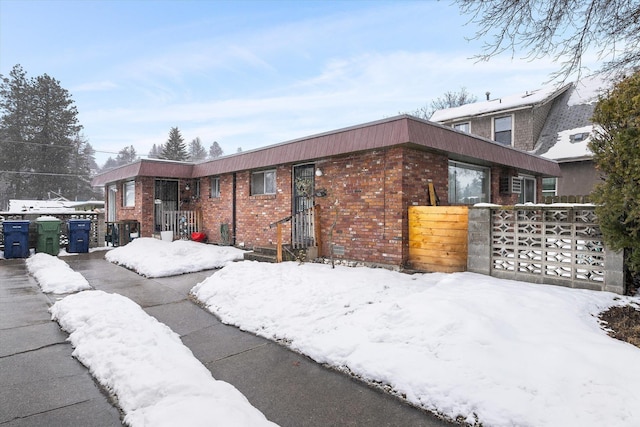 view of front of property with brick siding