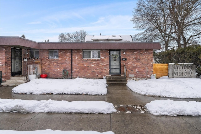 view of front facade with brick siding