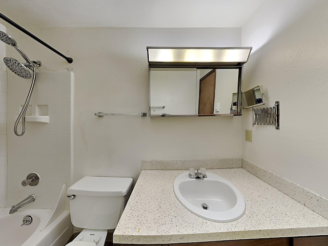 bathroom with toilet, washtub / shower combination, and vanity