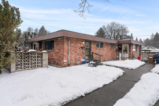 view of front of property with brick siding