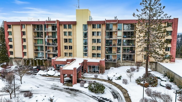 view of snow covered property