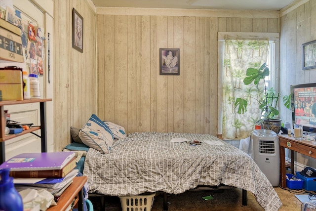 bedroom with wood walls