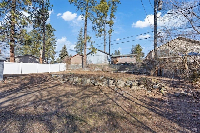 view of yard with fence