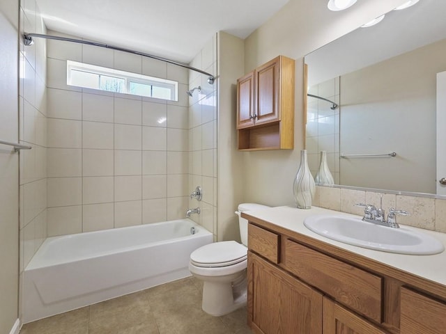 full bath with toilet, tile patterned flooring, bathtub / shower combination, and vanity