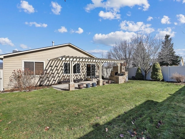 rear view of house featuring a yard, fence, a patio, and a pergola