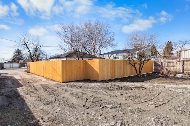 view of yard featuring fence