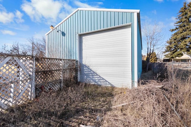 garage featuring fence