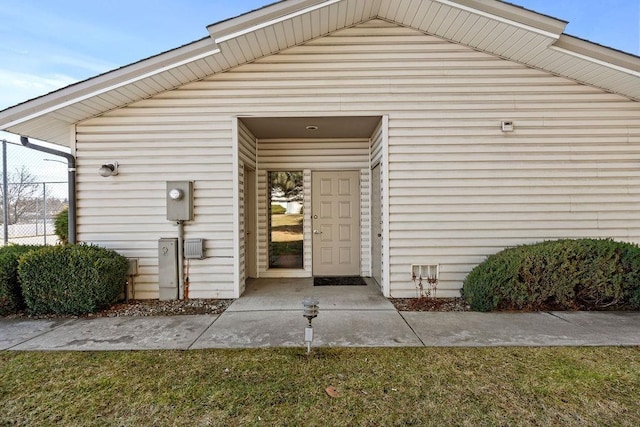 property entrance with fence