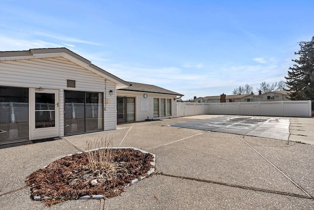 exterior space with a patio area and fence