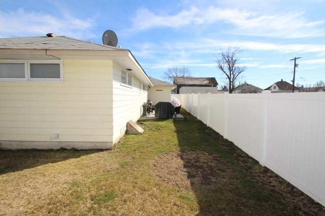 view of yard featuring a fenced backyard