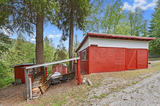 view of outbuilding featuring an outdoor structure