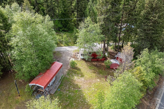 exterior space with a forest view