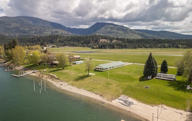 bird's eye view featuring a water and mountain view