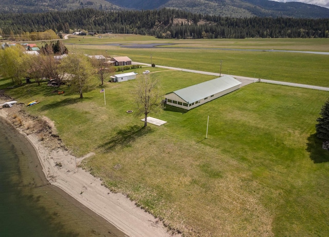 bird's eye view with a rural view, a mountain view, and a forest view