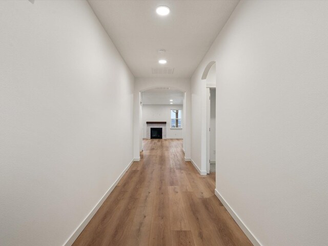 office space featuring french doors, baseboards, and wood finished floors