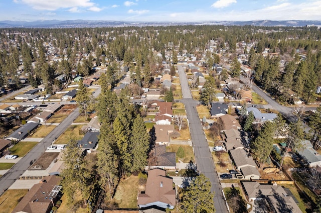 birds eye view of property featuring a mountain view and a residential view