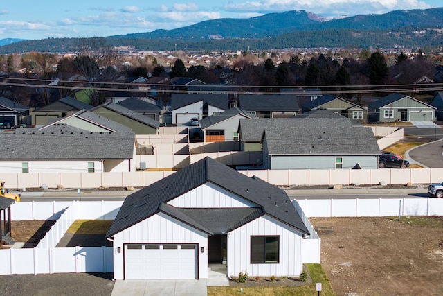 aerial view with a residential view and a mountain view