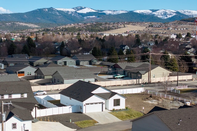 birds eye view of property featuring a residential view and a mountain view