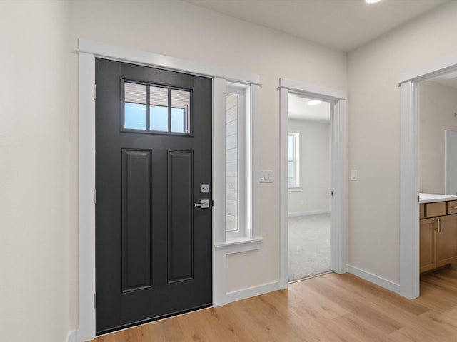 1624 S Moen St Unit 3/1Orchard, Spokane Valley, WA 99016 - entrance foyer featuring light wood finished floors and baseboards