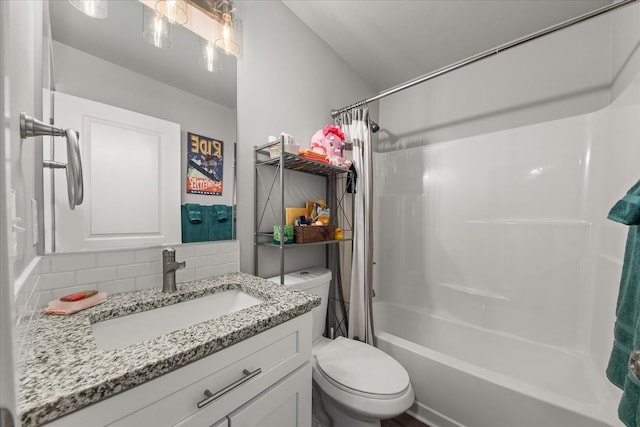 bathroom with shower / bath combo, vanity, toilet, and decorative backsplash