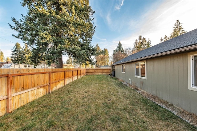 view of yard featuring a fenced backyard