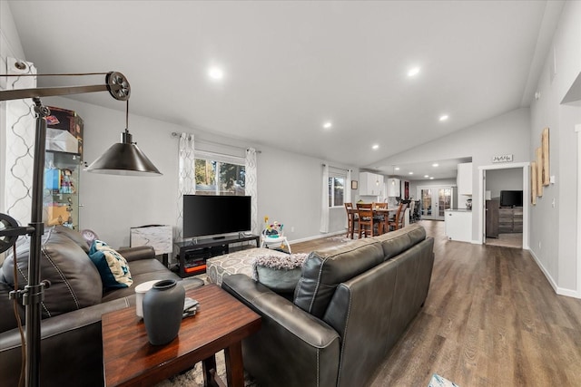 living room with lofted ceiling, baseboards, wood finished floors, and recessed lighting