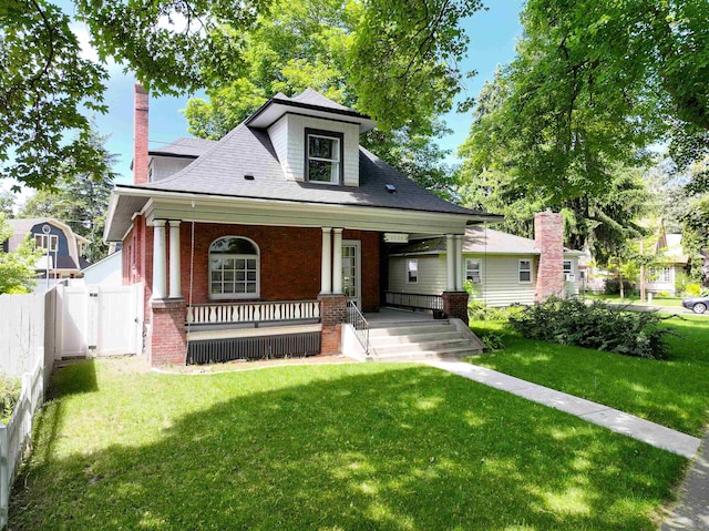 2508 S Grand Blvd, Spokane, WA 99203 - bungalow-style home featuring brick siding, a porch, and roof with shingles