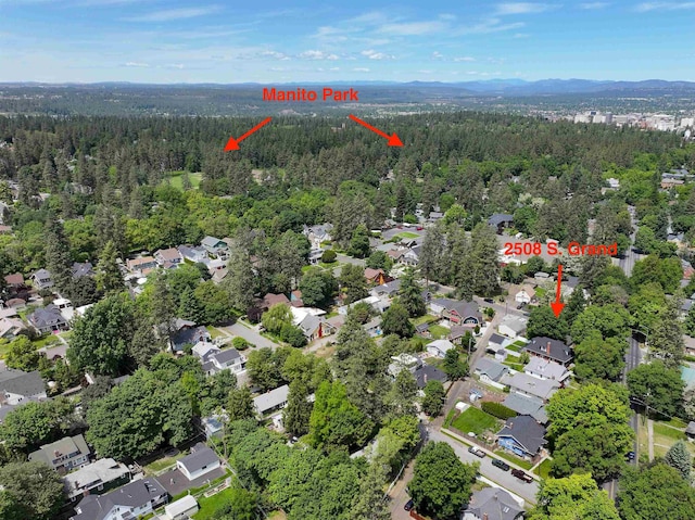 2508 S Grand Blvd, Spokane, WA 99203 - aerial overview of property's location with a forest and nearby suburban area