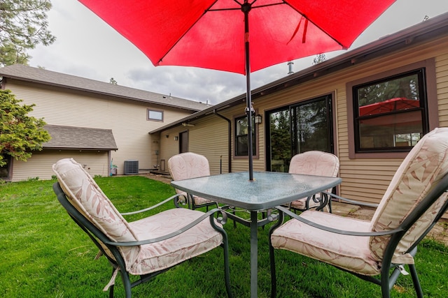 view of patio / terrace with outdoor dining space and cooling unit