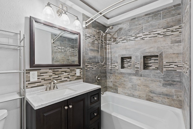 full bathroom featuring vanity, tasteful backsplash, shower / tub combination, and toilet