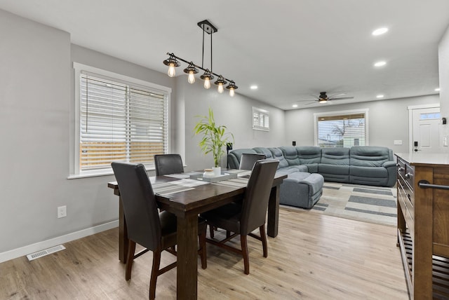 dining area featuring recessed lighting, a ceiling fan, visible vents, baseboards, and light wood-type flooring