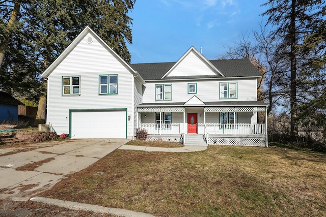 view of front of house with driveway, covered porch, an attached garage, and a front lawn