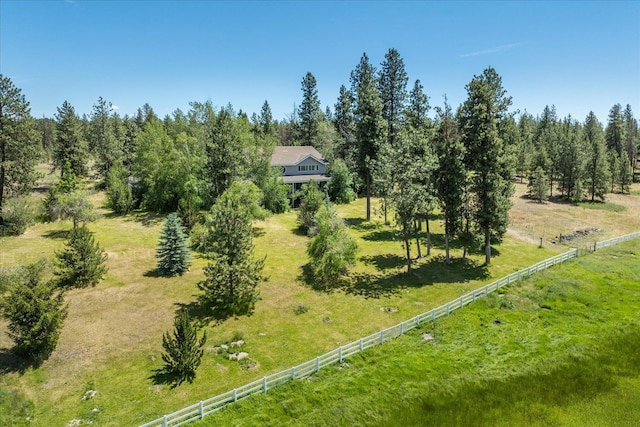 birds eye view of property with a rural view