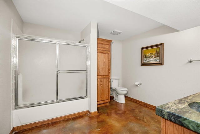 bathroom featuring baseboards, bath / shower combo with glass door, toilet, finished concrete floors, and vanity