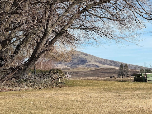 view of mountain feature featuring a rural view