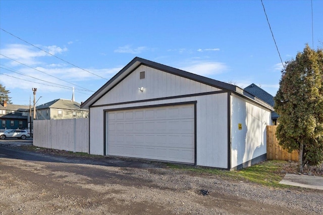 detached garage with fence