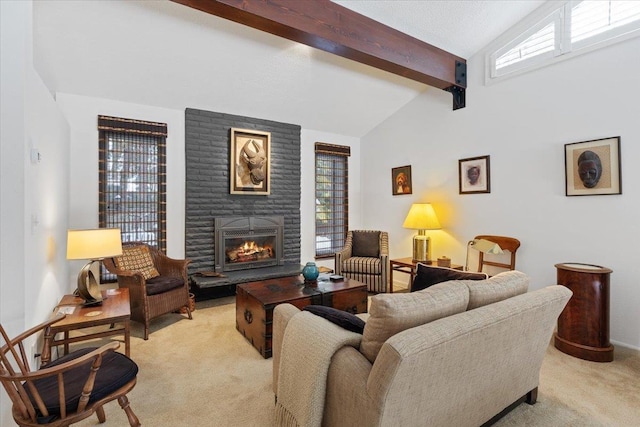 living area featuring vaulted ceiling with beams, a fireplace, and light colored carpet