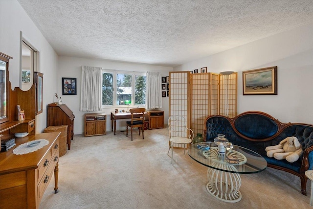 living room with light carpet and a textured ceiling