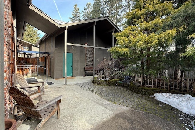 exterior space with a patio and fence