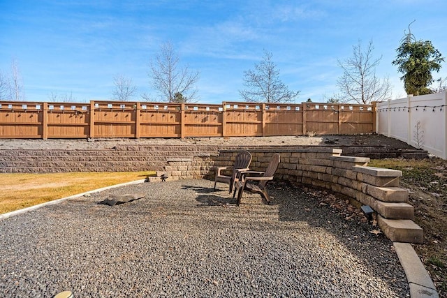 view of yard with a fenced backyard