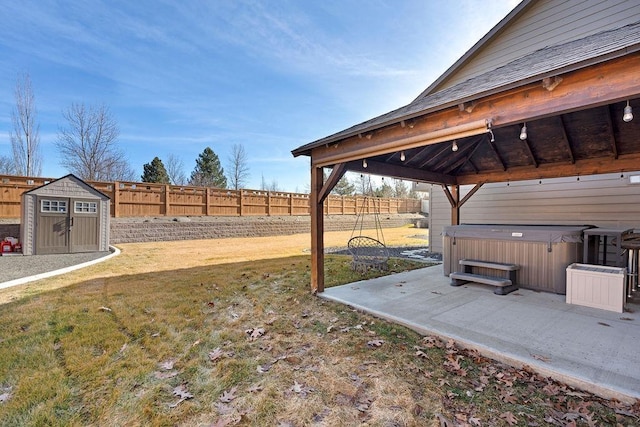 view of yard with a storage shed, a gazebo, an outdoor structure, and a fenced backyard