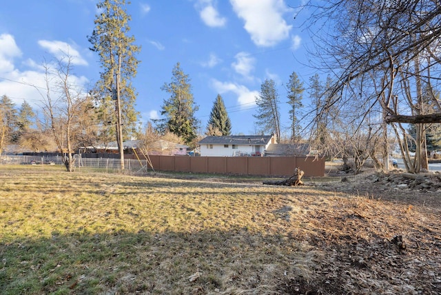 view of yard featuring fence