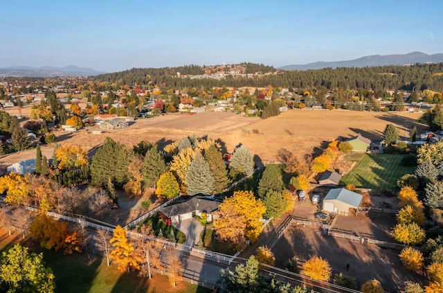 aerial view featuring a mountain view and a wooded view